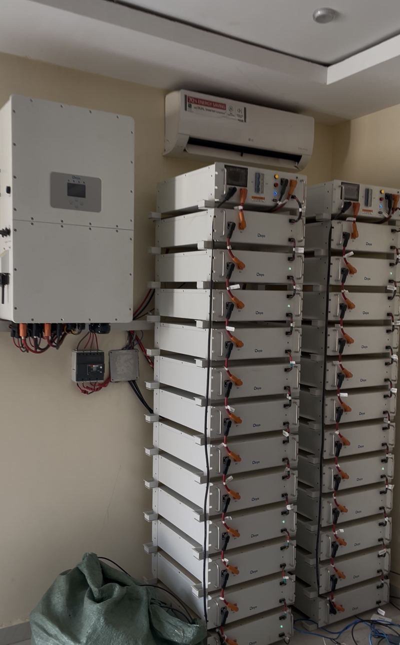 Solar inverter and battery storage racks installed in a plant room